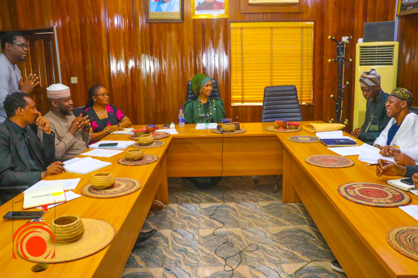 Members of the Central Committee in session with the Honourable Minister
