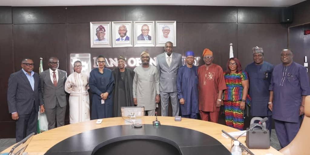 Group photograph of the Bank of Industry management with the summit organizing committee.